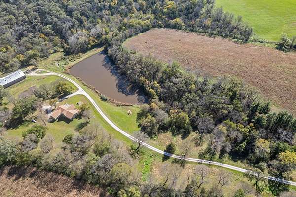 16 Acres of Recreational Land with Home for Sale in Van Meter, Iowa
