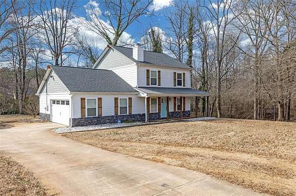 1.5 Acres of Land with Home for Sale in McDonough, Georgia