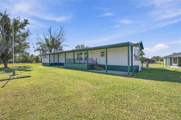 11 Acres of Land with Home for Sale in Chouteau, Oklahoma
