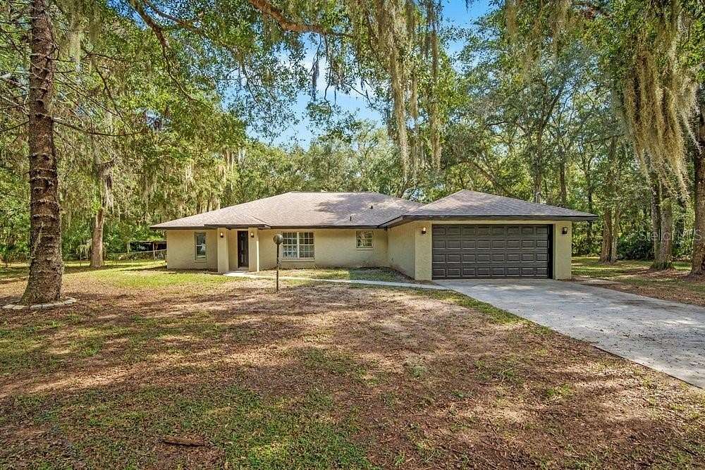 3.56 Acres of Land with Home for Sale in Oak Hill, Florida