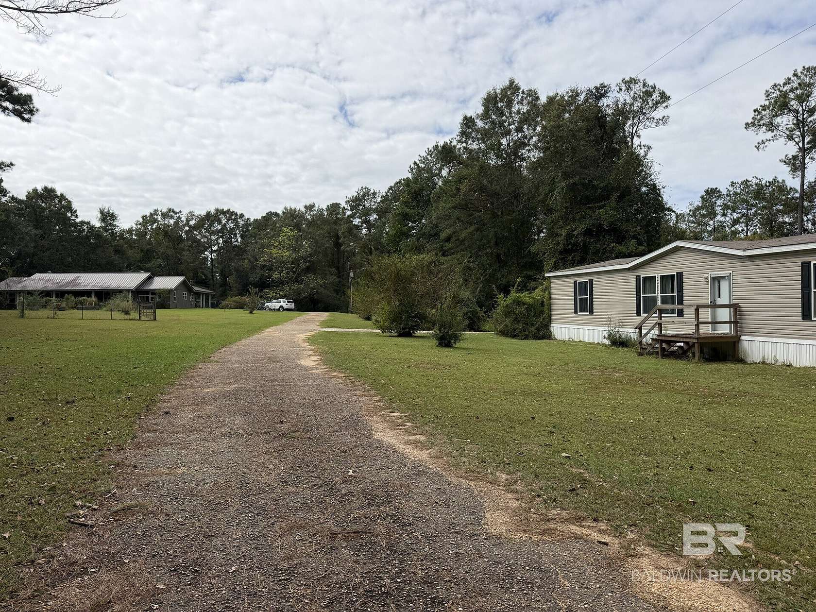 6.5 Acres of Land with Home for Sale in Bay Minette, Alabama