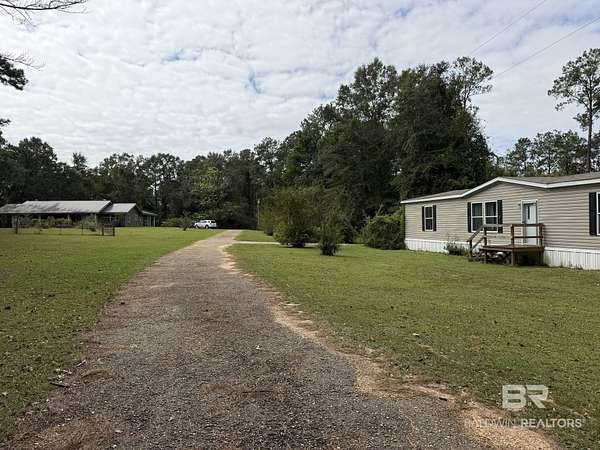 6.5 Acres of Land with Home for Sale in Bay Minette, Alabama