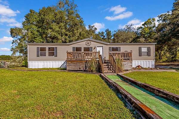 14.9 Acres of Recreational Land with Home for Sale in Branford, Florida