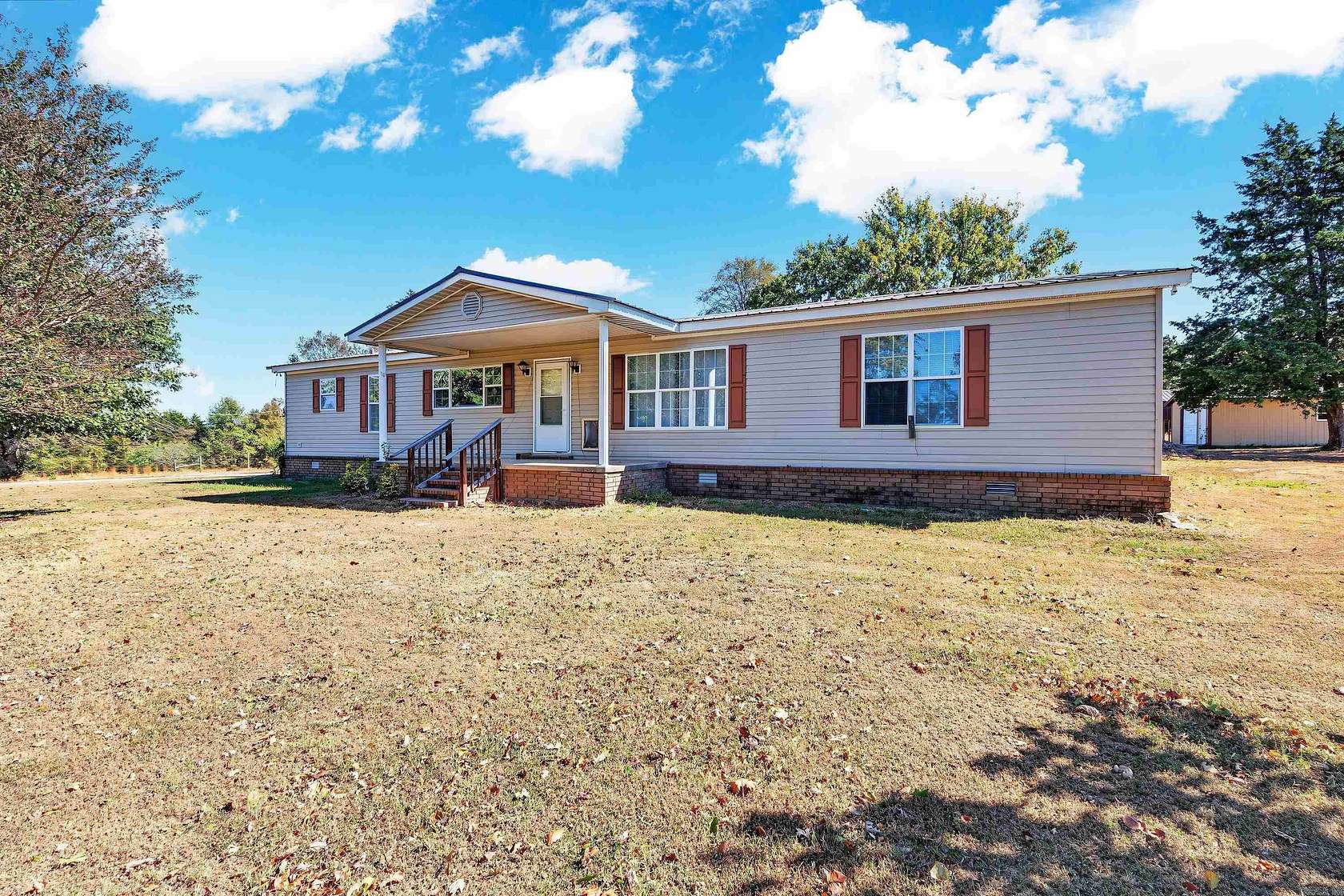 7.24 Acres of Land with Home for Sale in Greenbrier, Arkansas