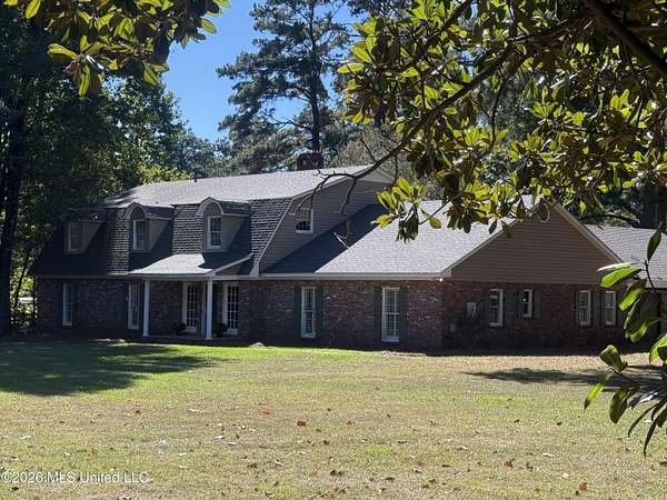 5 Acres of Land with Home for Sale in Madison, Mississippi