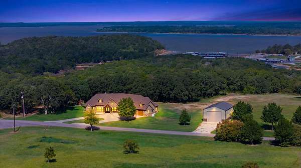 38.5 Acres of Recreational Land with Home for Sale in Gordonville, Texas