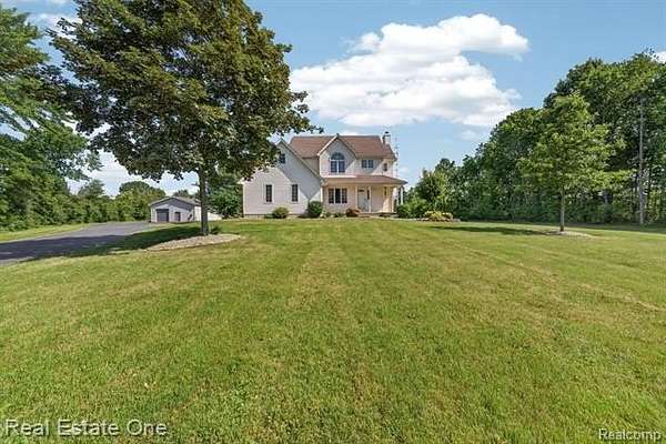 7 Acres of Land with Home for Sale in Ash Township, Michigan