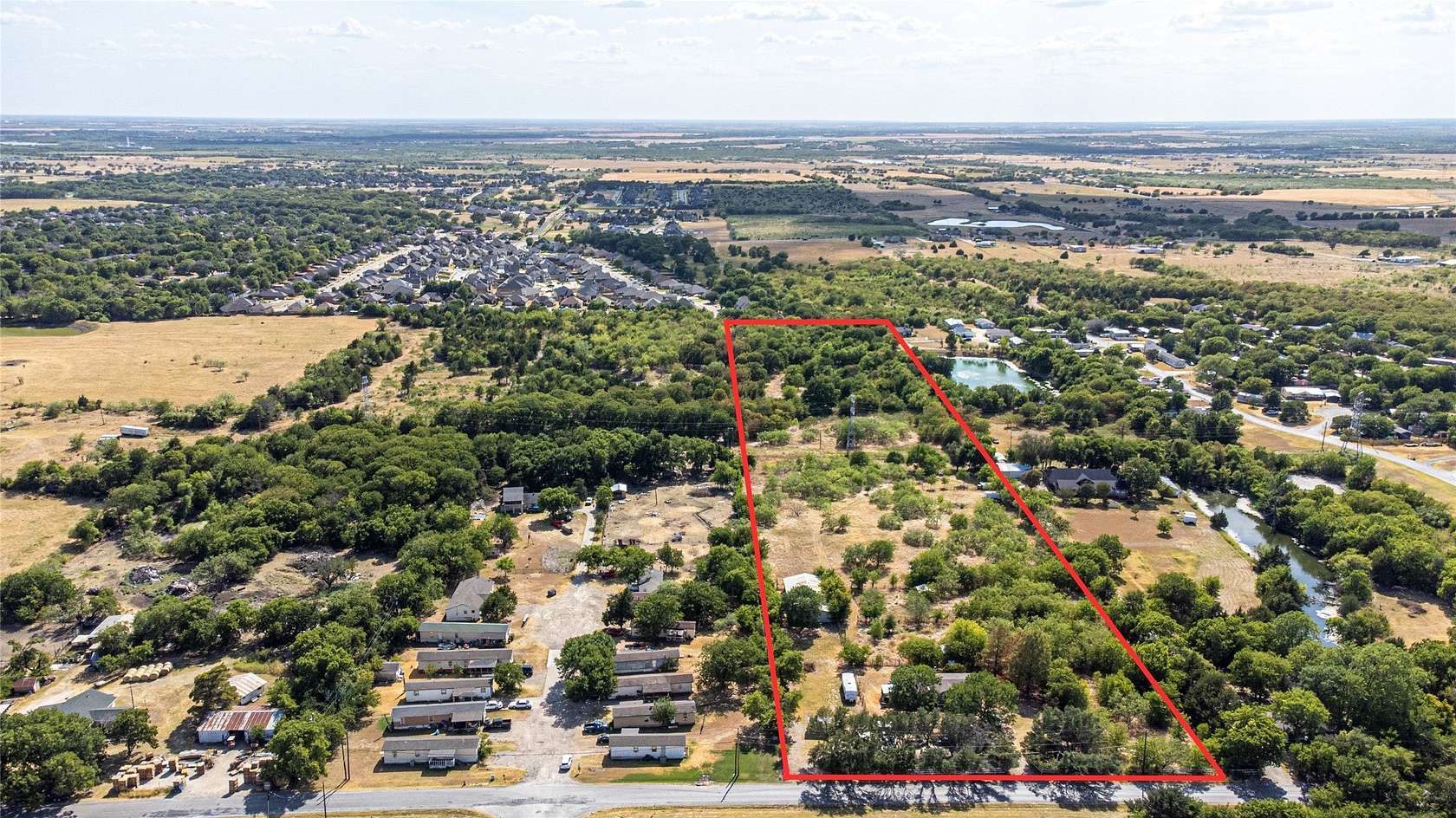 11.7 Acres of Land with Home for Sale in Ennis, Texas