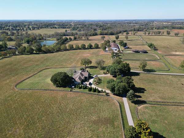 262 Acres of Agricultural Land with Home for Sale in Versailles, Kentucky