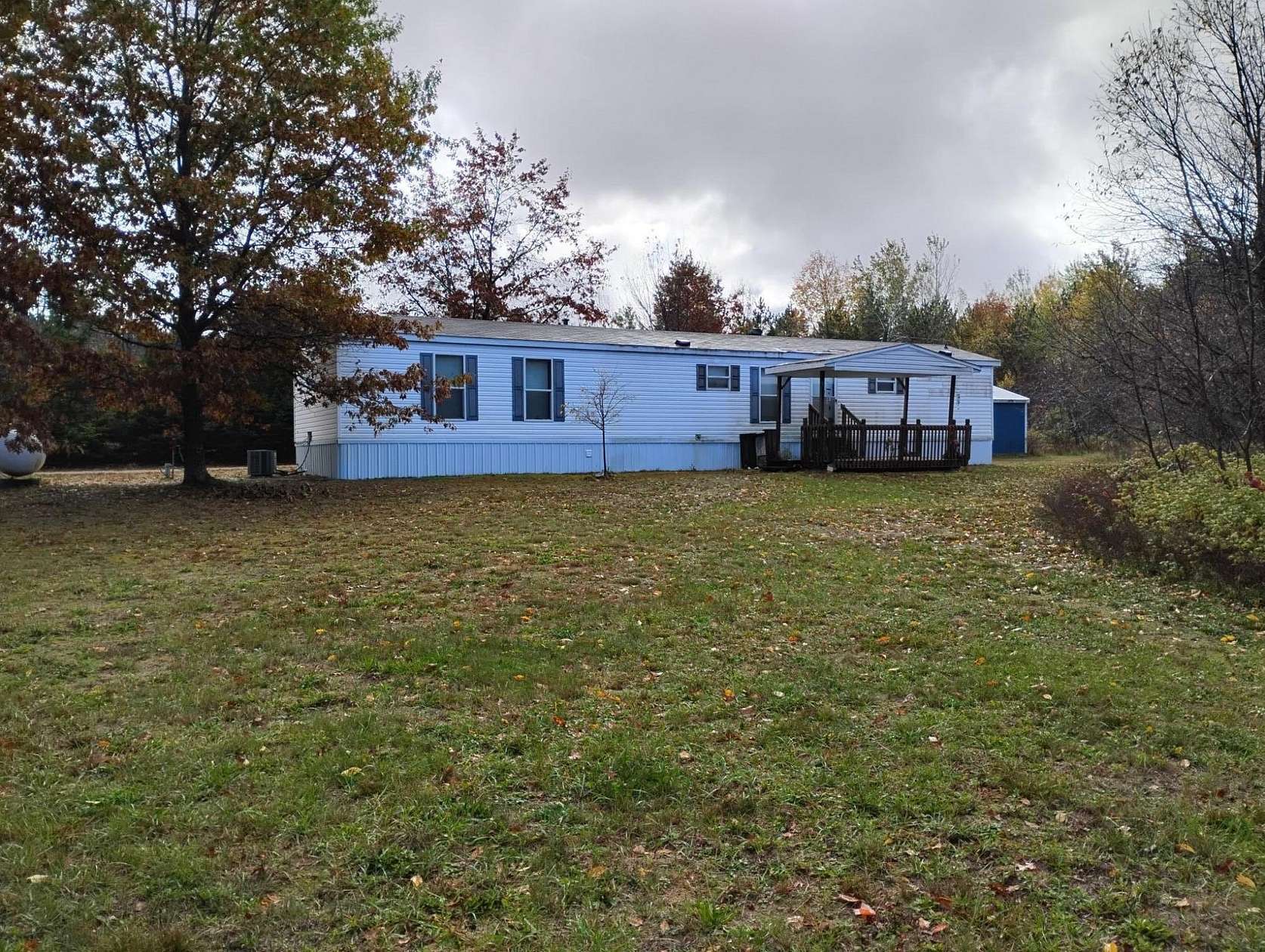 4.79 Acres of Land with Home for Sale in McBain, Michigan