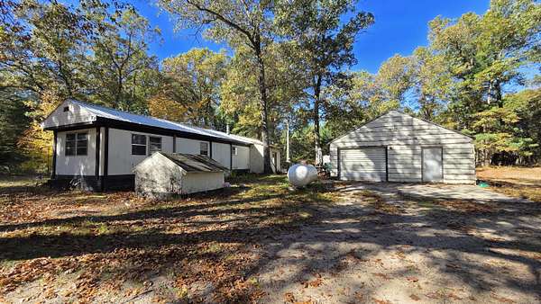 1.65 Acres of Land with Home for Sale in Twin Lake, Michigan