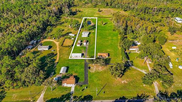 2 Acres of Land with Home for Sale in Clermont, Florida