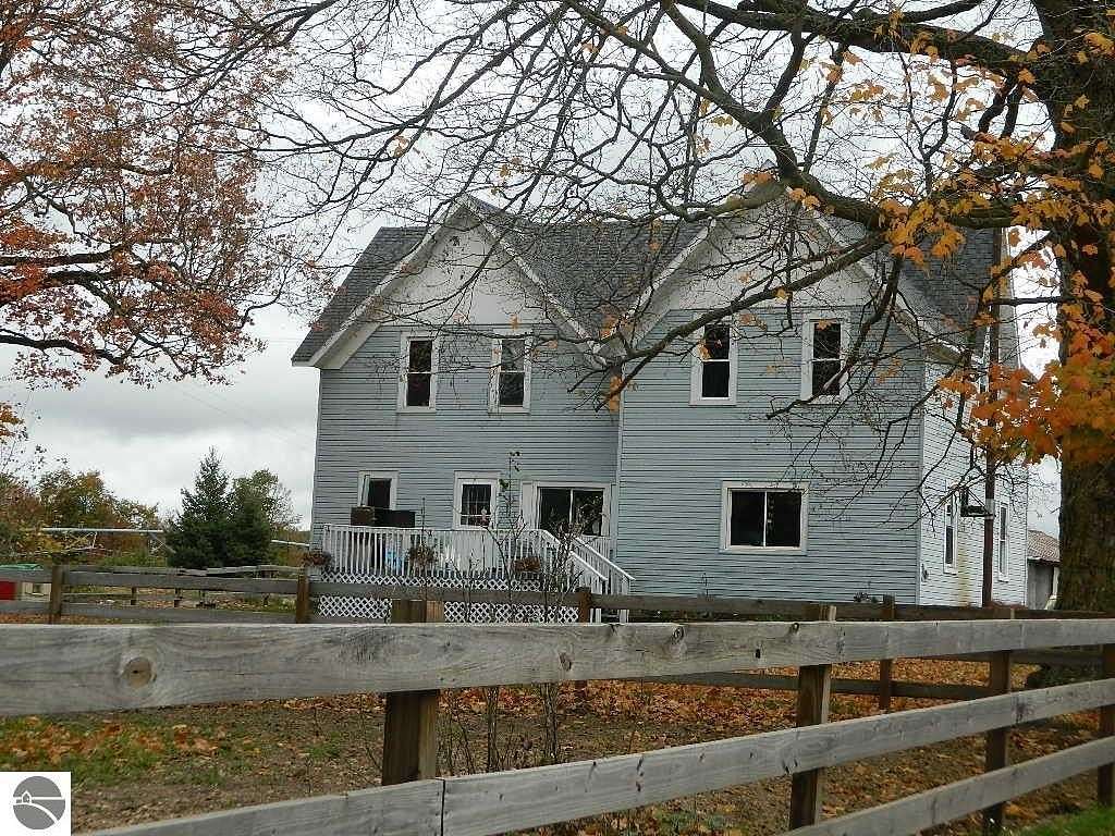 10 Acres of Land with Home for Sale in Blanchard, Michigan
