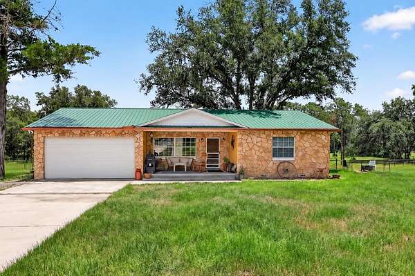 9.73 Acres of Land with Home for Sale in Apopka, Florida