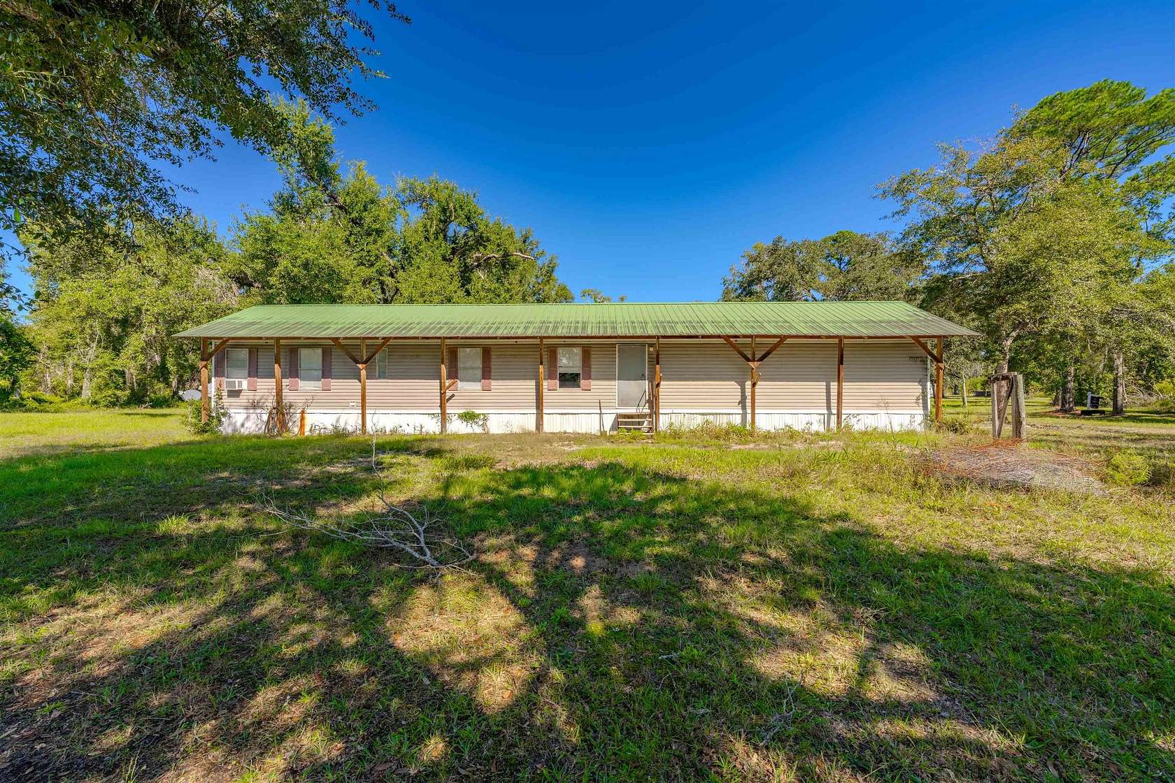 5 Acres of Land with Home for Sale in Perry, Florida