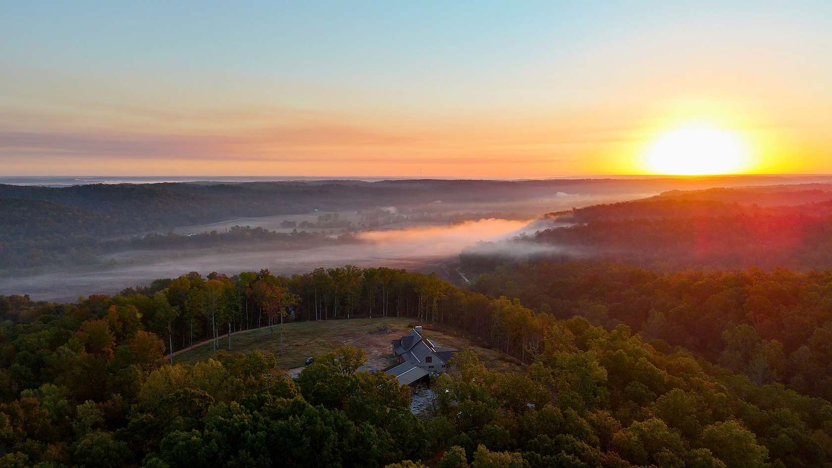 65 Acres of Recreational Land with Home for Sale in Centerville, Tennessee