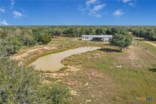 10.8 Acres of Land with Home for Sale in Hallettsville, Texas