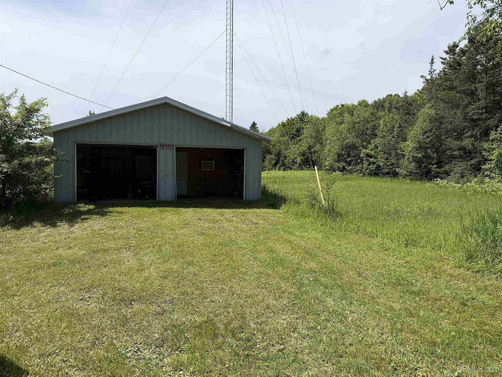 0.82 Acres of Improved Commercial Land for Sale in Munising, Michigan
