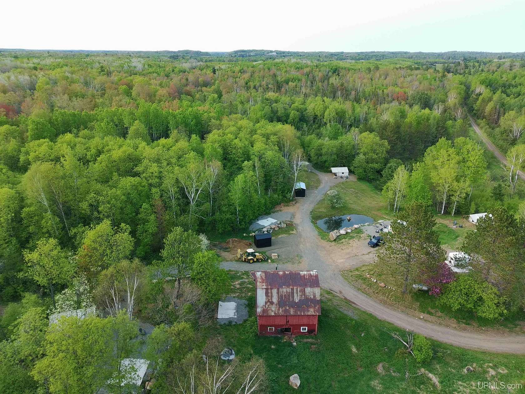 112 Acres of Land for Sale in Champion, Michigan