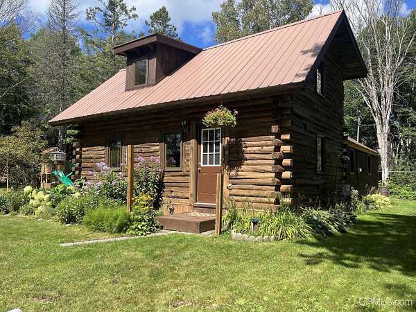 2 Acres of Land with Home for Sale in Skandia, Michigan