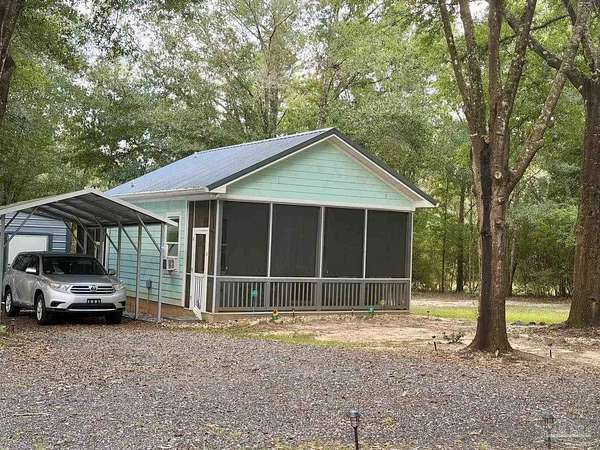 0.58 Acres of Land with Home for Sale in Milton, Florida