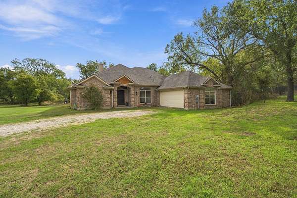 29.7 Acres of Recreational Land with Home for Sale in Springtown, Texas