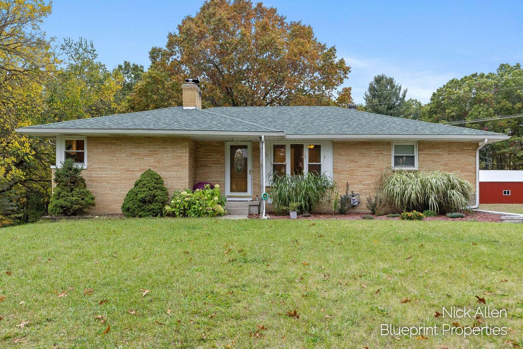 2 Acres of Land with Home for Sale in Rockford, Michigan