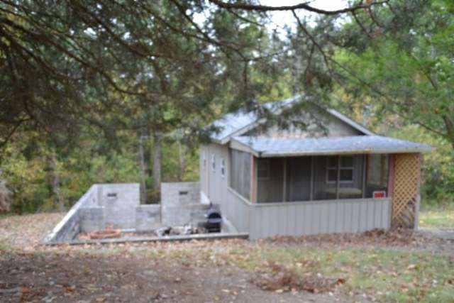 0.59 Acres of Land with Home for Sale in Celina, Tennessee