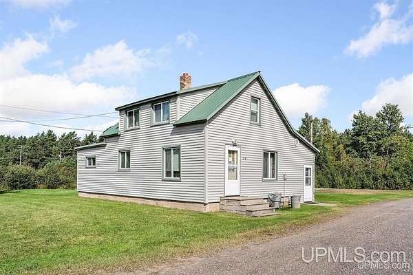 2.45 Acres of Land with Home for Sale in Champion, Michigan
