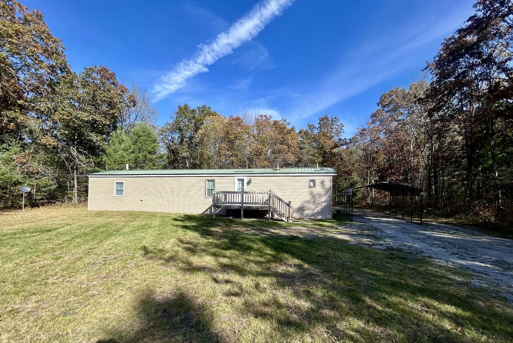 2.5 Acres of Land with Home for Sale in Roscommon, Michigan