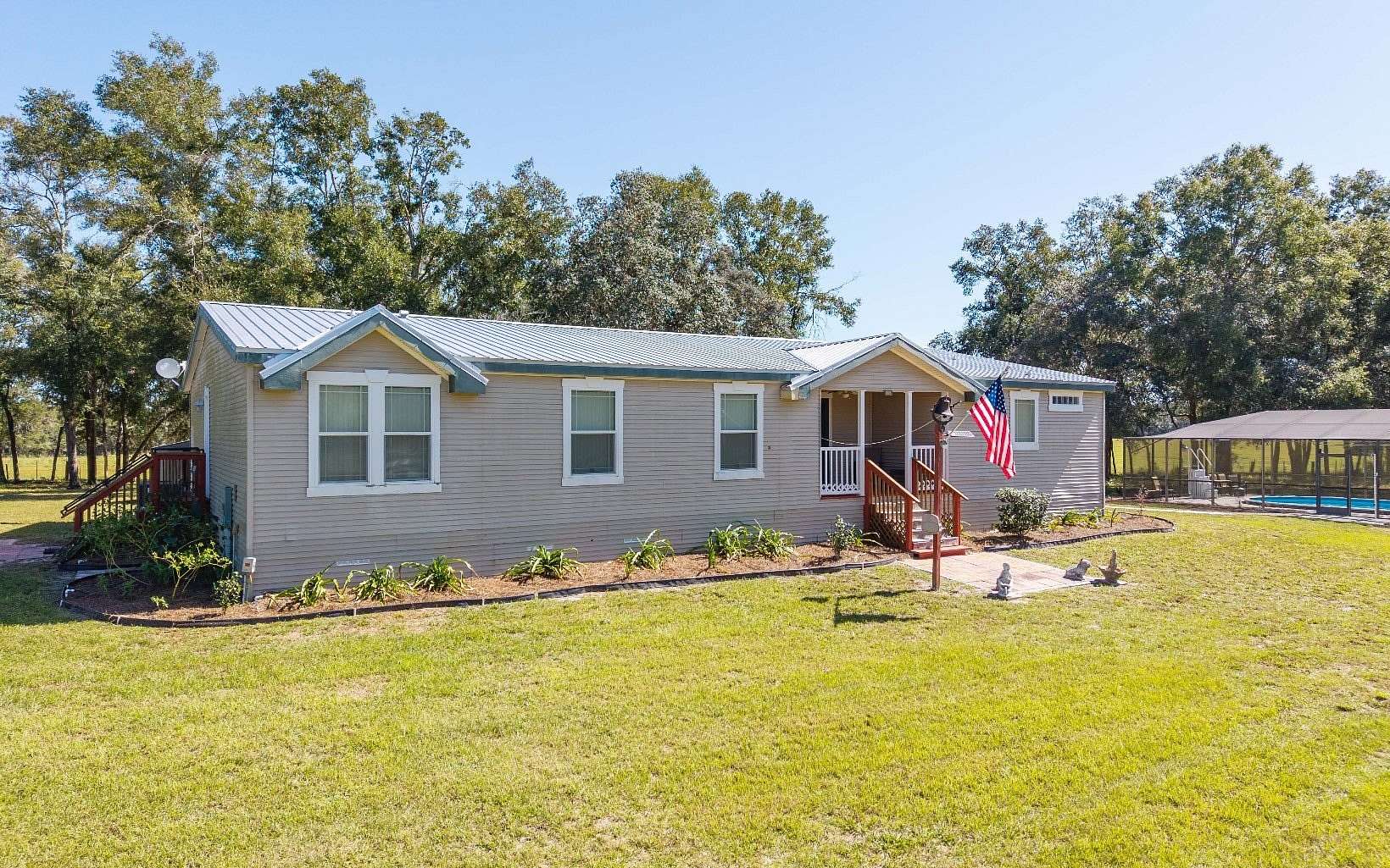 10.4 Acres of Land with Home for Sale in McAlpin, Florida