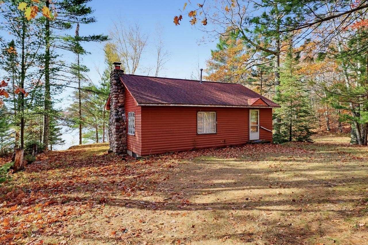 10 Acres of Recreational Land with Home for Sale in Arbor Vitae, Wisconsin