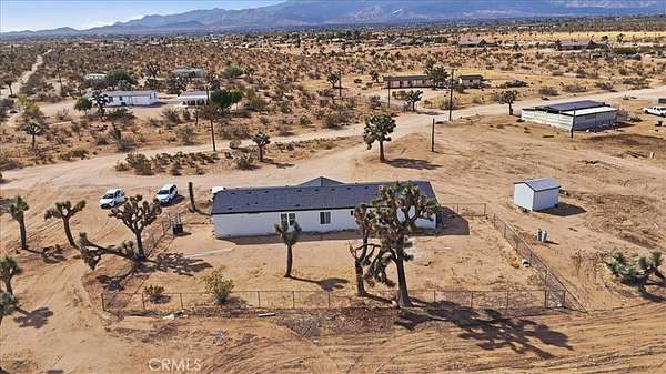 4.77 Acres of Land with Home for Sale in Phelan, California