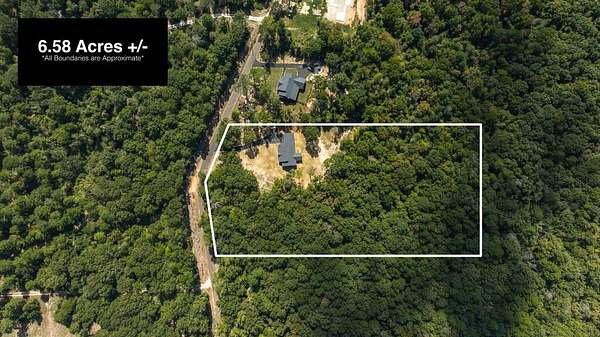6.58 Acres of Land with Home for Sale in Nacogdoches, Texas