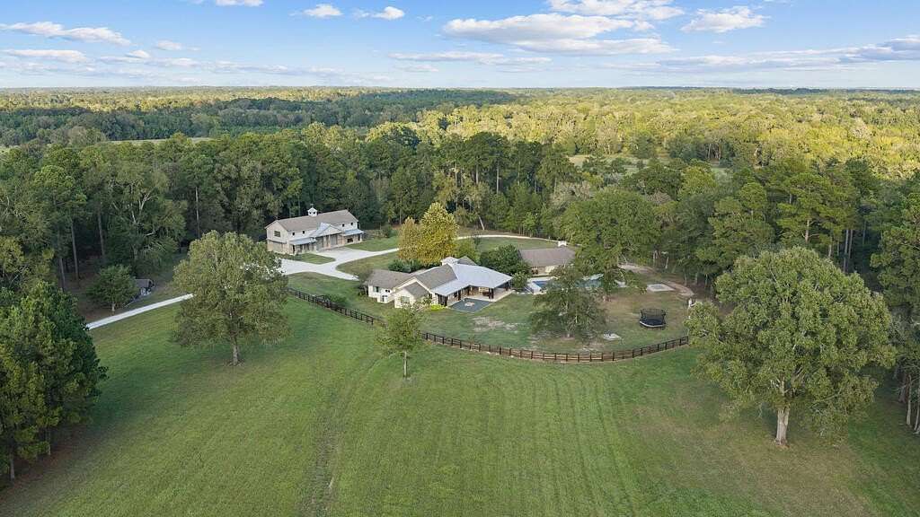85.6 Acres of Agricultural Land with Home for Sale in Lufkin, Texas