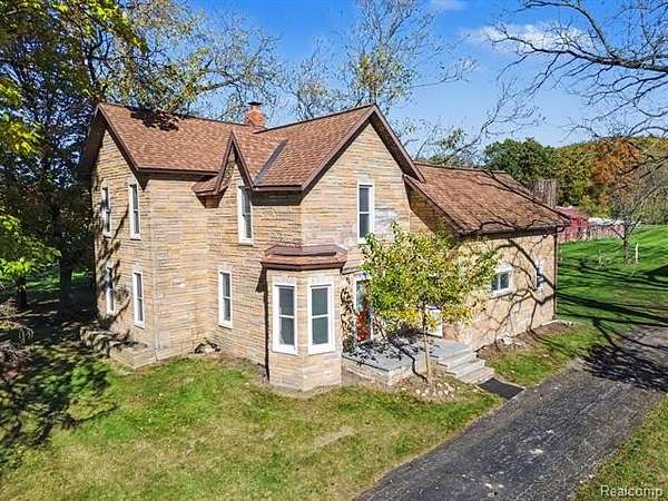 14 Acres of Land with Home for Sale in Springfield Township, Michigan
