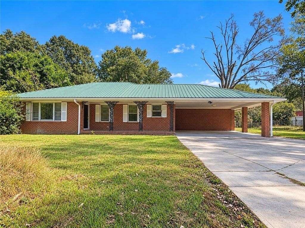 5.6 Acres of Land with Home for Sale in Snellville, Georgia