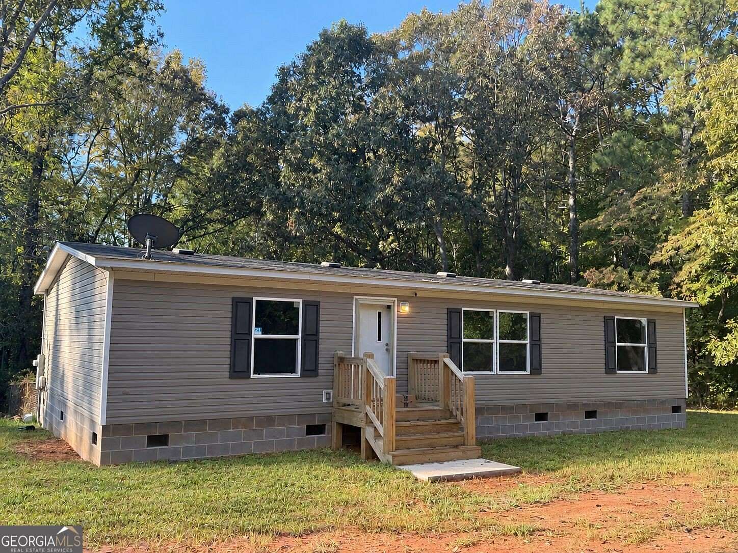 1.66 Acres of Land with Home for Sale in Waco, Georgia