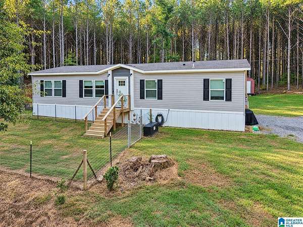 7.7 Acres of Land with Home for Sale in Springville, Alabama