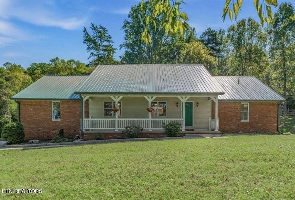 1.69 Acres of Land with Home for Sale in Oliver Springs, Tennessee
