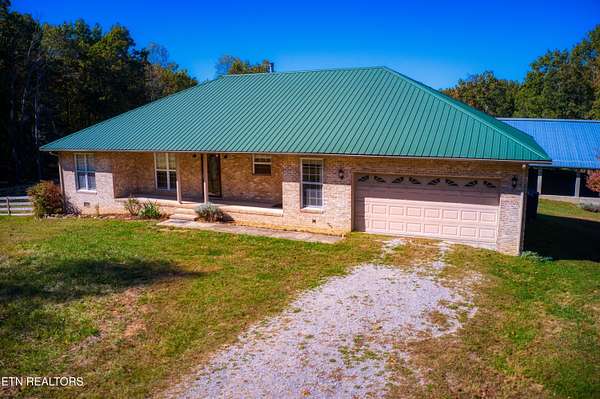 7.7 Acres of Land with Home for Sale in Jamestown, Tennessee