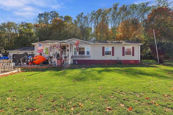 1.69 Acres of Land with Home for Sale in Lyons, Michigan