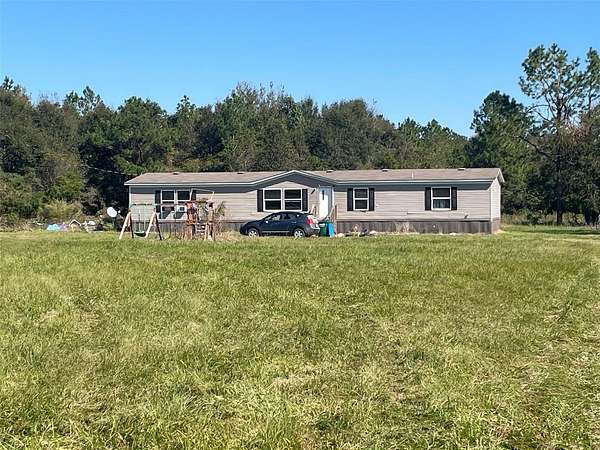 2.5 Acres of Land with Home for Sale in Marianna, Florida