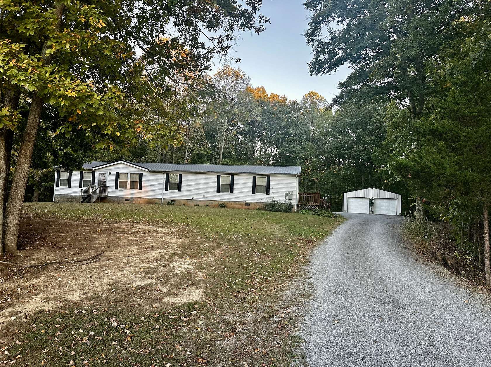 5.55 Acres of Land with Home for Sale in Whitleyville, Tennessee