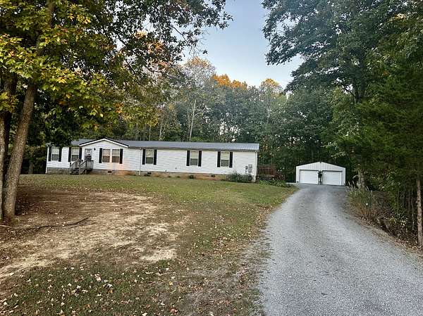 5.55 Acres of Land with Home for Sale in Whitleyville, Tennessee