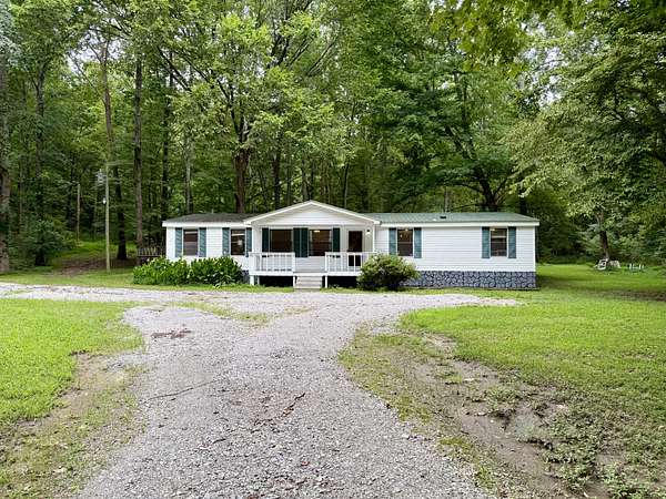 6.76 Acres of Land with Home for Sale in Dickson, Tennessee