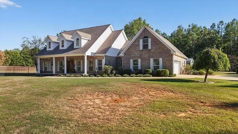 14 Acres of Land with Home for Sale in Fulton, Mississippi