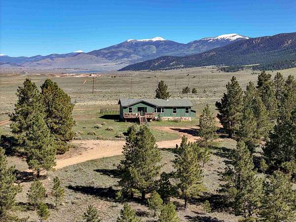 5 Acres of Land with Home for Sale in Angel Fire, New Mexico