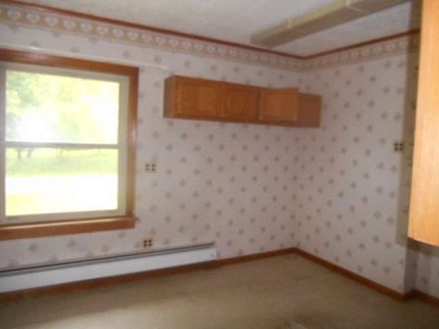 9 Acres of Land with Home for Sale in Corry, Pennsylvania