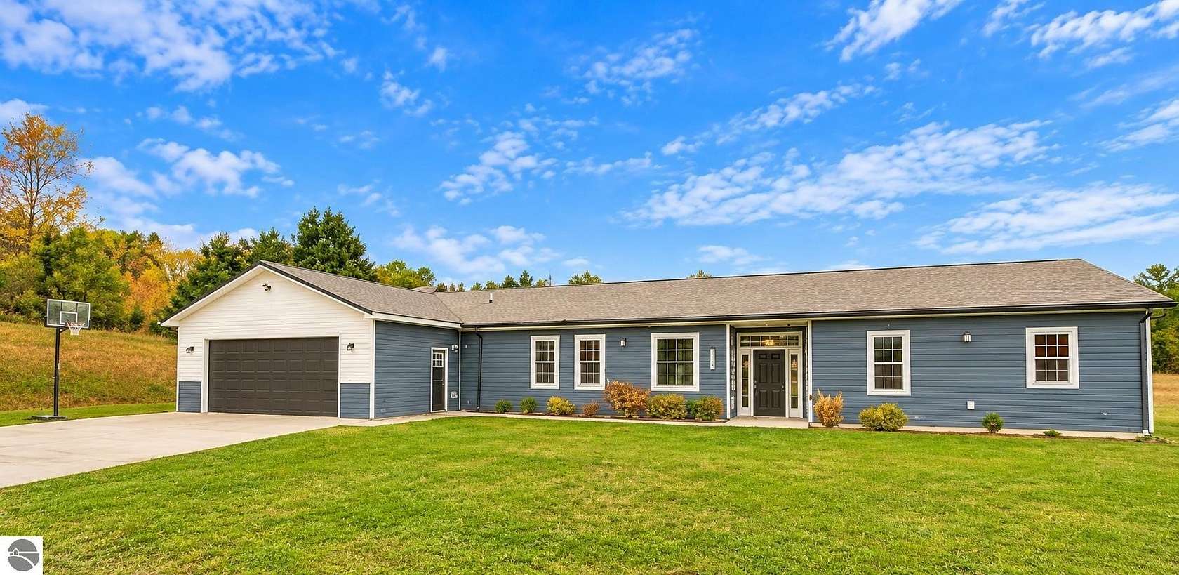 12.7 Acres of Recreational Land with Home for Sale in Cedar, Michigan